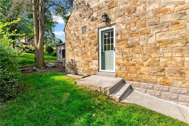4649 Rolling Hills Rd, Whitehall, PA 15236 - doorway to property featuring stone siding and a yard