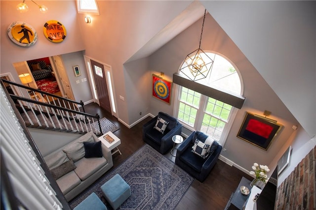 407 Highland Ct, Marshall, PA 15090 - living area featuring a high ceiling, wood finished floors, baseboards, a chandelier, and stairway