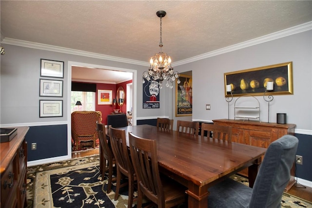 407 Highland Ct, Marshall, PA 15090 - dining area with a chandelier, ornamental molding, baseboards, and a textured ceiling