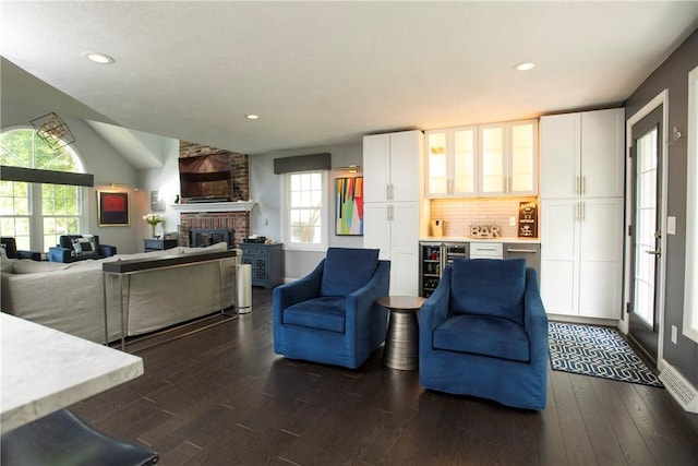 407 Highland Ct, Marshall, PA 15090 - living area with a fireplace, dark wood finished floors, beverage cooler, a dry bar, and recessed lighting
