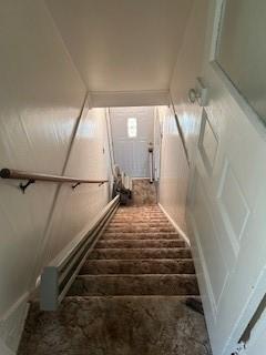 202 S Quarry St, East Huntingdon, PA 15666 - stairway featuring brick floors