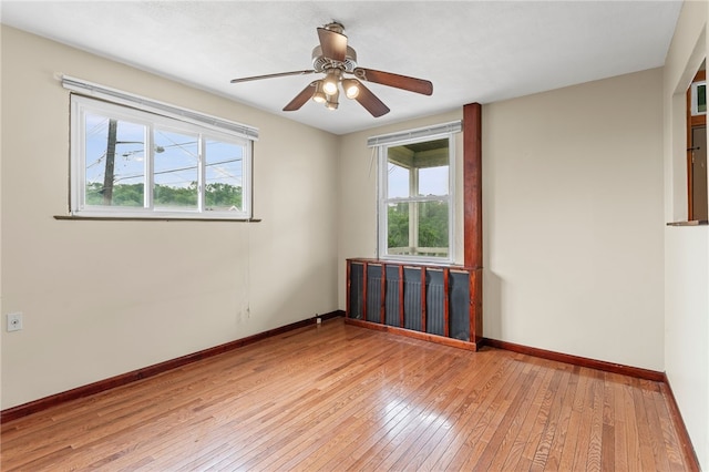 1913 Saint Paul St, South Side, PA 15203 - unfurnished room featuring light wood-style flooring, plenty of natural light, and baseboards