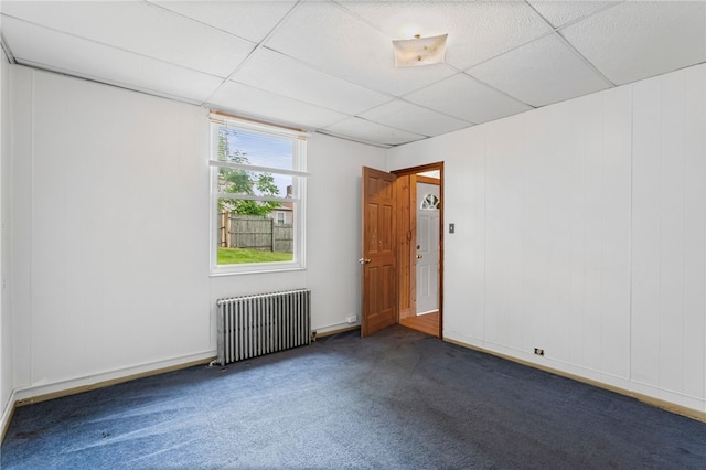 1913 Saint Paul St, South Side, PA 15203 - empty room with radiator, carpet floors, and a drop ceiling