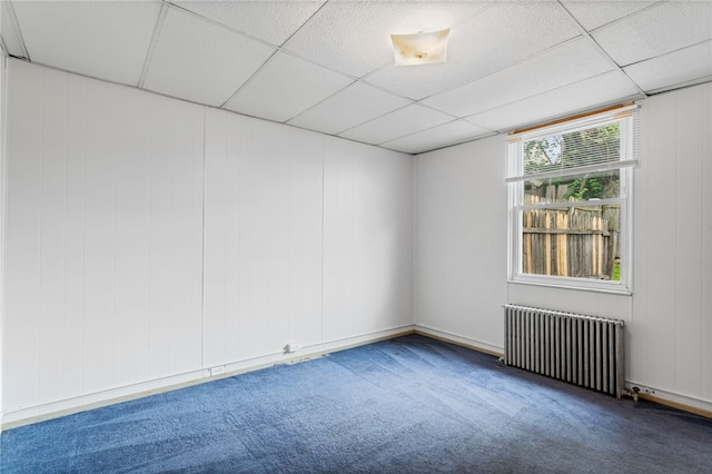 1913 Saint Paul St, South Side, PA 15203 - carpeted spare room featuring radiator and a drop ceiling