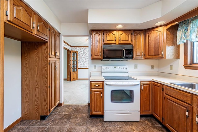 28 Saddlebrook Dr, Hempfield Twp Wml, PA 15601 - kitchen with black microwave, white range with electric cooktop, brown cabinetry, baseboards, and wallpapered walls