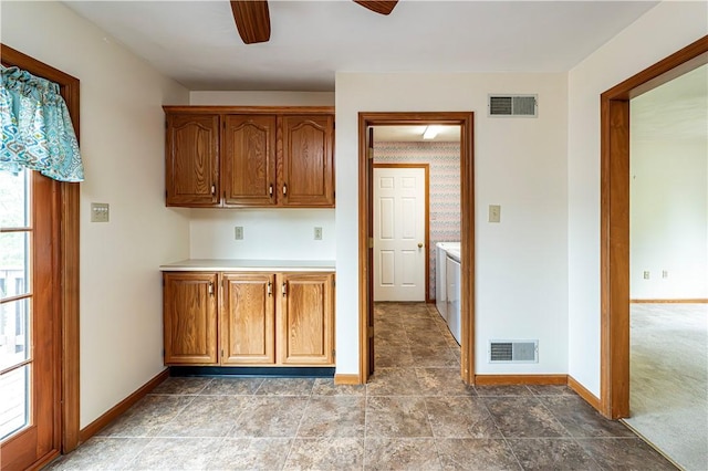 28 Saddlebrook Dr, Hempfield Twp Wml, PA 15601 - kitchen with a ceiling fan, baseboards, and brown cabinetry