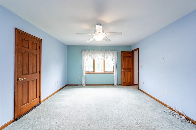 28 Saddlebrook Dr, Hempfield Twp Wml, PA 15601 - spare room featuring a ceiling fan, light colored carpet, and baseboards