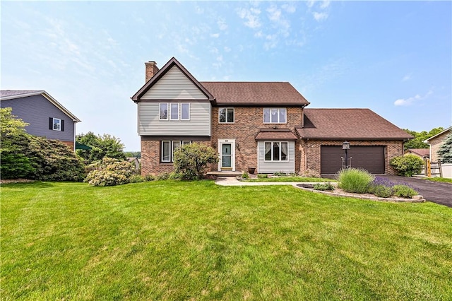 28 Saddlebrook Dr, Hempfield Twp Wml, PA 15601 - view of front of home with brick siding, asphalt driveway, a chimney, an attached garage, and a front lawn