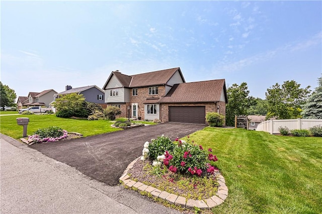 28 Saddlebrook Dr, Hempfield Twp Wml, PA 15601 - view of front of house featuring brick siding, a garage, and asphalt driveway