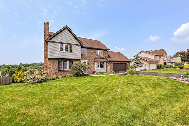 28 Saddlebrook Dr, Hempfield Twp Wml, PA 15601 - view of front facade with brick siding, a chimney, a garage, and driveway
