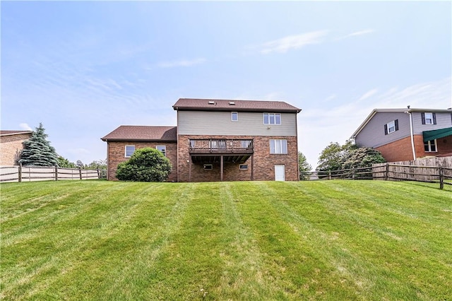 28 Saddlebrook Dr, Hempfield Twp Wml, PA 15601 - rear view of property featuring a wooden deck and brick siding