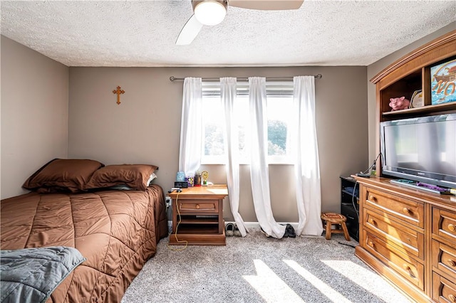 1941 Ivanhoe Dr, North Huntingdon, PA 15642 - bedroom featuring carpet floors, a textured ceiling, and a ceiling fan