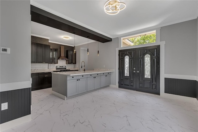 615 Cliff Ave, Bellevue, PA 15202 - foyer entrance featuring light marble finish flooring, a chandelier, and wainscoting