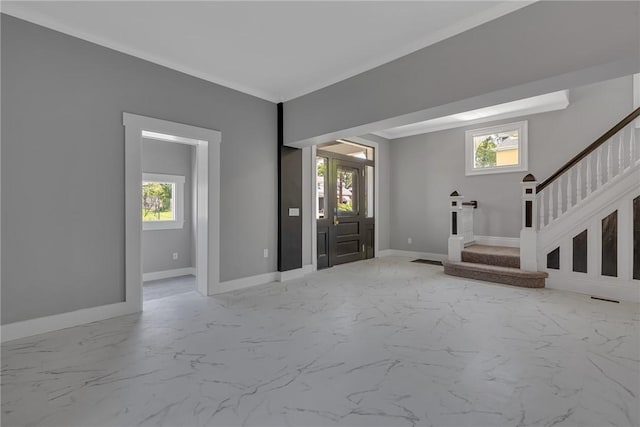615 Cliff Ave, Bellevue, PA 15202 - entryway with marble finish flooring, stairs, healthy amount of natural light, and ornamental molding