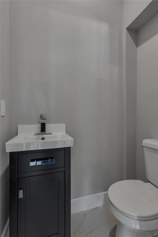615 Cliff Ave, Bellevue, PA 15202 - half bathroom featuring vanity and marble look tile flooring