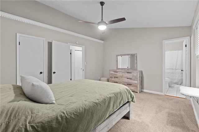509 Cresthaven Dr, Plum Boro, PA 15239 - bedroom with light carpet, ensuite bath, baseboards, lofted ceiling, and ceiling fan