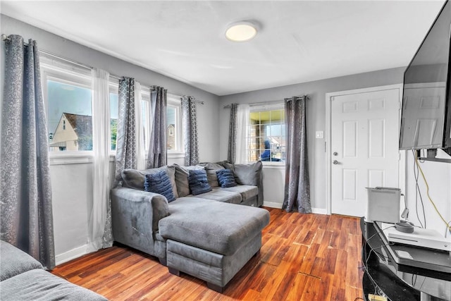 439 Ford St, West Mifflin, PA 15122 - living area featuring baseboards and wood finished floors