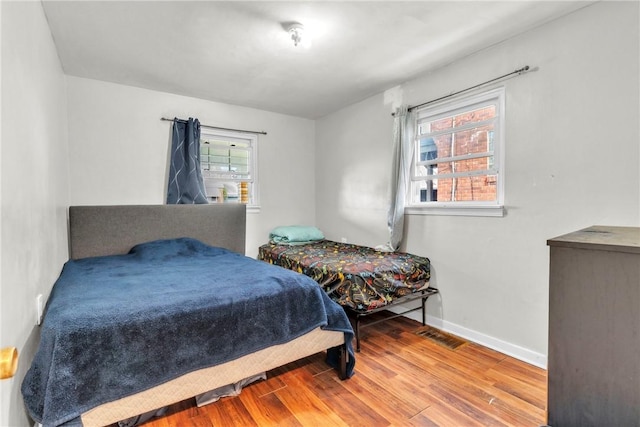 439 Ford St, West Mifflin, PA 15122 - bedroom with wood finished floors and baseboards