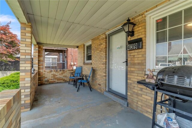 439 Ford St, West Mifflin, PA 15122 - covered porch featuring area for grilling