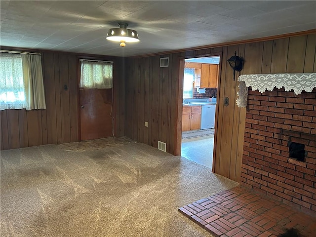 1214 Ridge Blvd, Dunbar Twp, PA 15425 - empty room with wood walls and carpet floors
