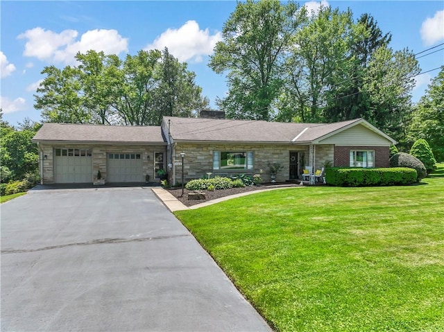 1033 Colvin Dr, Brighton Twp, PA 15009 - single story home with stone siding, an attached garage, asphalt driveway, and a front lawn