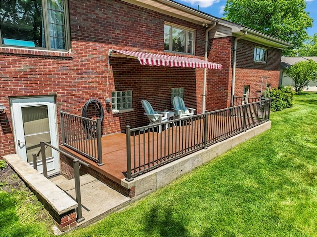 1033 Colvin Dr, Brighton Twp, PA 15009 - rear view of property with a yard, a deck, and brick siding