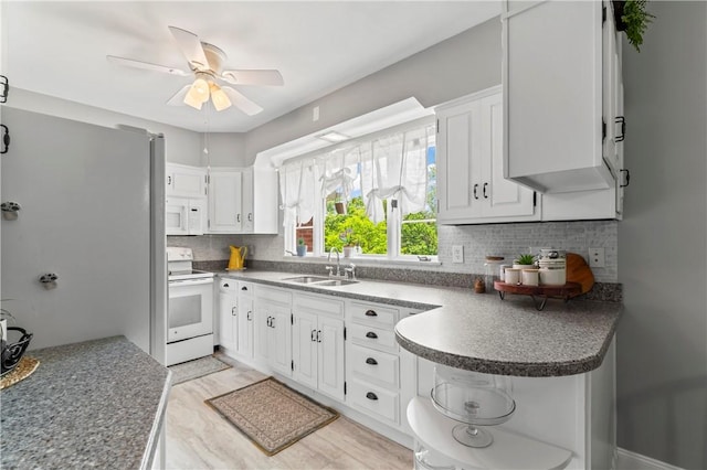 1033 Colvin Dr, Brighton Twp, PA 15009 - kitchen featuring white appliances, a sink, decorative backsplash, and white cabinets