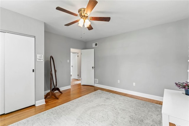 1033 Colvin Dr, Brighton Twp, PA 15009 - bedroom featuring baseboards, wood finished floors, a ceiling fan, and a closet