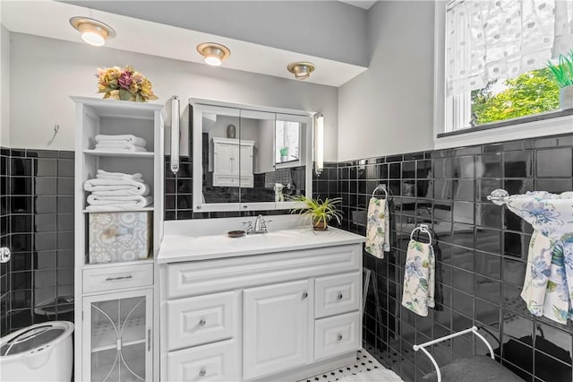 1033 Colvin Dr, Brighton Twp, PA 15009 - bathroom with tile walls, vanity, and wainscoting