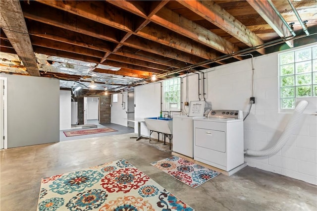 1033 Colvin Dr, Brighton Twp, PA 15009 - basement featuring washing machine and clothes dryer, a sink, plenty of natural light, and concrete block wall