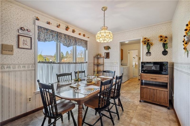 229 Crawford Ln, Rostraver, PA 15012 - dining room featuring wallpapered walls, a chandelier, ornamental molding, and light tile patterned flooring