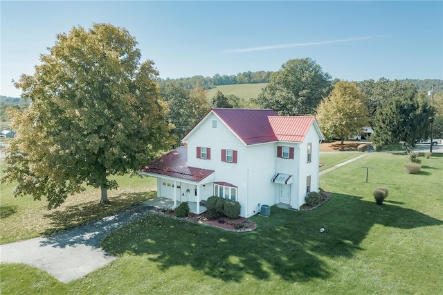 198 Gastown Rd, Plumcreek Twp, PA 15774 - view of side of home featuring asphalt driveway, a yard, metal roof, and a standing seam roof