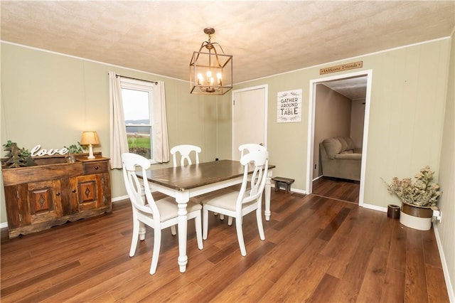 198 Gastown Rd, Plumcreek Twp, PA 15774 - dining area with a chandelier, dark wood-type flooring, and baseboards