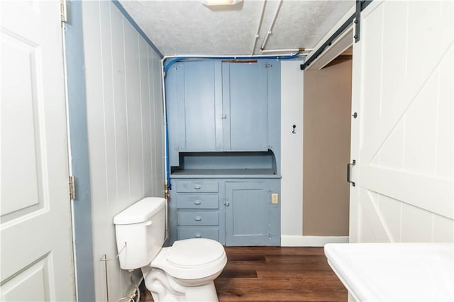 198 Gastown Rd, Plumcreek Twp, PA 15774 - bathroom featuring wood finished floors, toilet, and baseboards