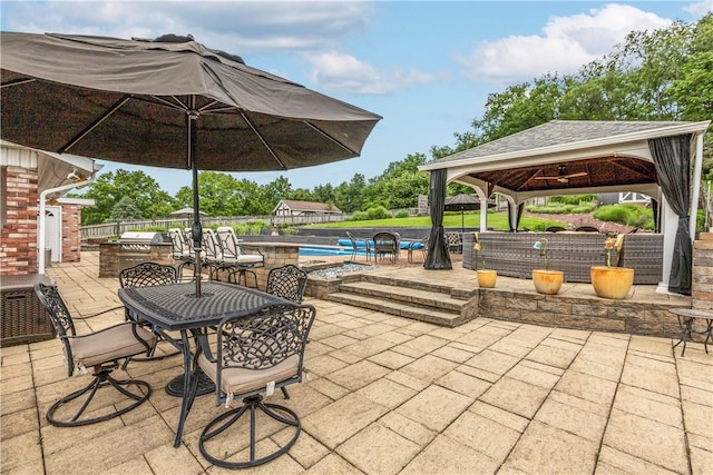 375 Navaho Hollow Rd, Coolbaugh Twp, PA 15438 - view of patio / terrace with a gazebo, an outdoor pool, ceiling fan, and exterior kitchen