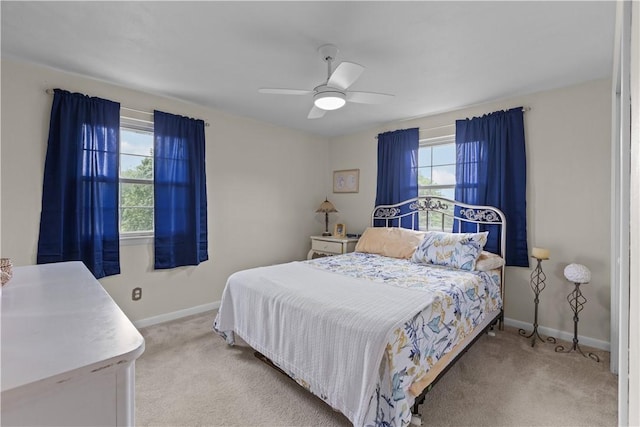 375 Navaho Hollow Rd, Coolbaugh Twp, PA 15438 - bedroom featuring light colored carpet, multiple windows, and baseboards