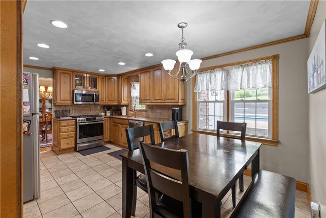 375 Navaho Hollow Rd, Coolbaugh Twp, PA 15438 - dining space with a chandelier, recessed lighting, light tile patterned floors, ornamental molding, and baseboards