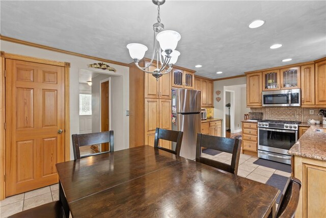 375 Navaho Hollow Rd, Coolbaugh Twp, PA 15438 - dining space with light tile patterned floors, a chandelier, crown molding, and recessed lighting
