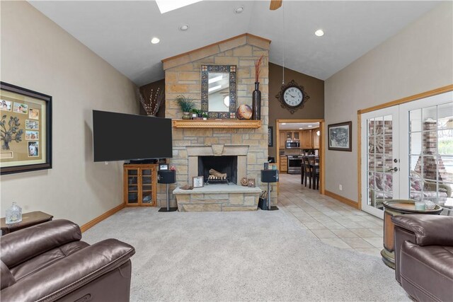 375 Navaho Hollow Rd, Coolbaugh Twp, PA 15438 - living area with carpet flooring, baseboards, a stone fireplace, high vaulted ceiling, and recessed lighting