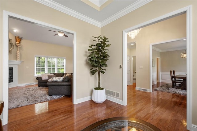8007 Pressley Ct, Mccandless, PA 15237 - hall with a chandelier, wood finished floors, crown molding, and baseboards