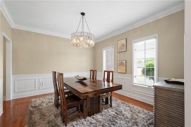 8007 Pressley Ct, Mccandless, PA 15237 - dining area with a chandelier, wood finished floors, crown molding, and a wainscoted wall