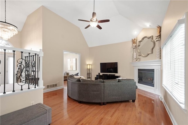 8007 Pressley Ct, Mccandless, PA 15237 - living area featuring a ceiling fan, plenty of natural light, and high vaulted ceiling