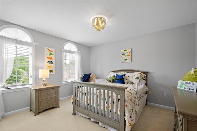 8007 Pressley Ct, Mccandless, PA 15237 - bedroom featuring light carpet, multiple windows, and baseboards