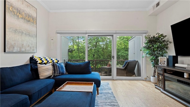 718 Carriage Cir, Pennsbury, PA 15205 - living room featuring light wood-style floors and ornamental molding