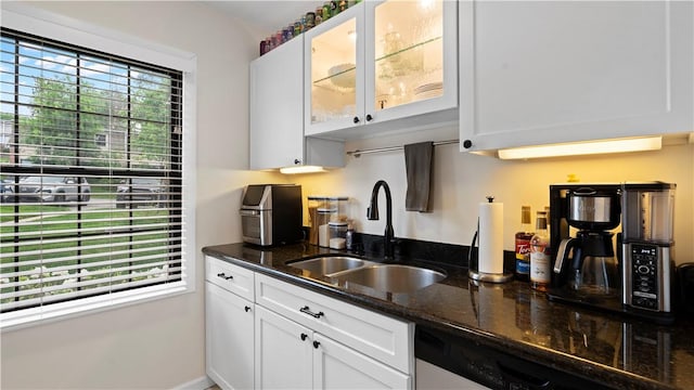718 Carriage Cir, Pennsbury, PA 15205 - kitchen with a sink, dishwasher, white cabinets, dark stone countertops, and glass insert cabinets