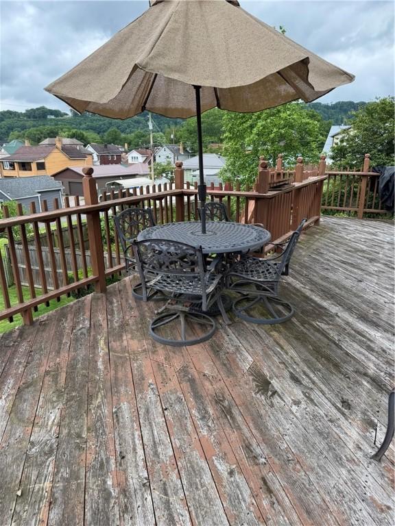 661 Johnston Ave, Kittanning Boro, PA 16201 - wooden deck featuring outdoor dining area