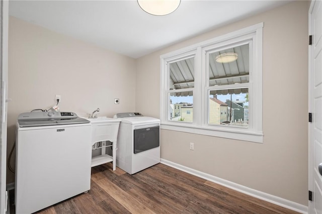 130 Pearl St, Bloomfield, PA 15224 - laundry room featuring dark wood-style floors, washer and dryer, and baseboards