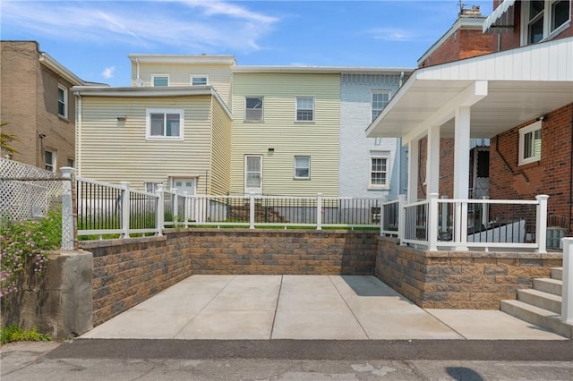 130 Pearl St, Bloomfield, PA 15224 - fenced backyard featuring a patio area