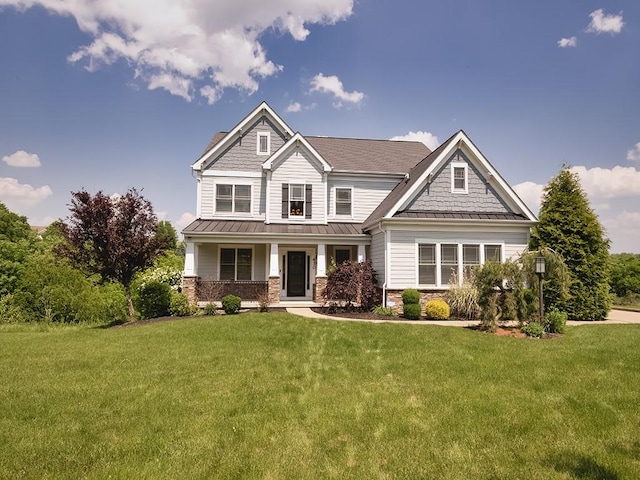 430 Longleaf Dr, Peters Twp, PA 15367 - craftsman-style home featuring a standing seam roof, a porch, a front lawn, stone siding, and metal roof