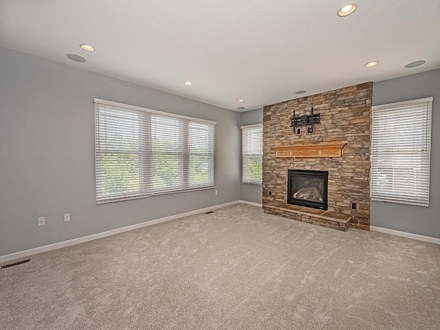 430 Longleaf Dr, Peters Twp, PA 15367 - unfurnished living room featuring carpet floors, recessed lighting, baseboards, and a stone fireplace